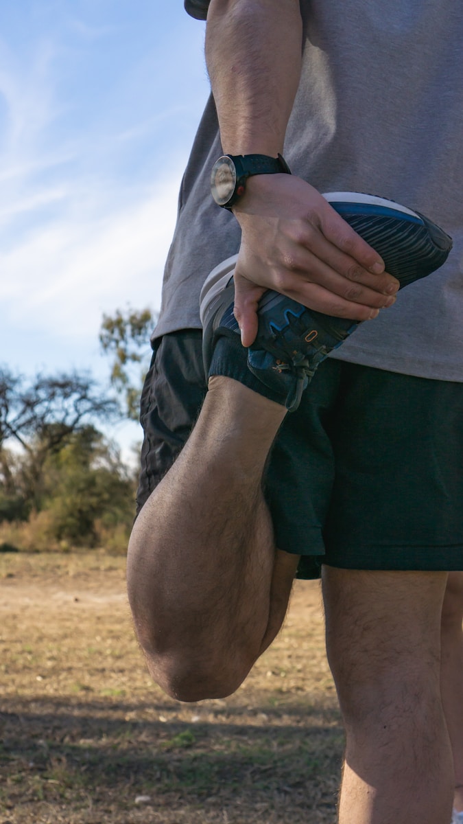 Photo by Federico Faccipieri a man holding a frisbee in his right hand