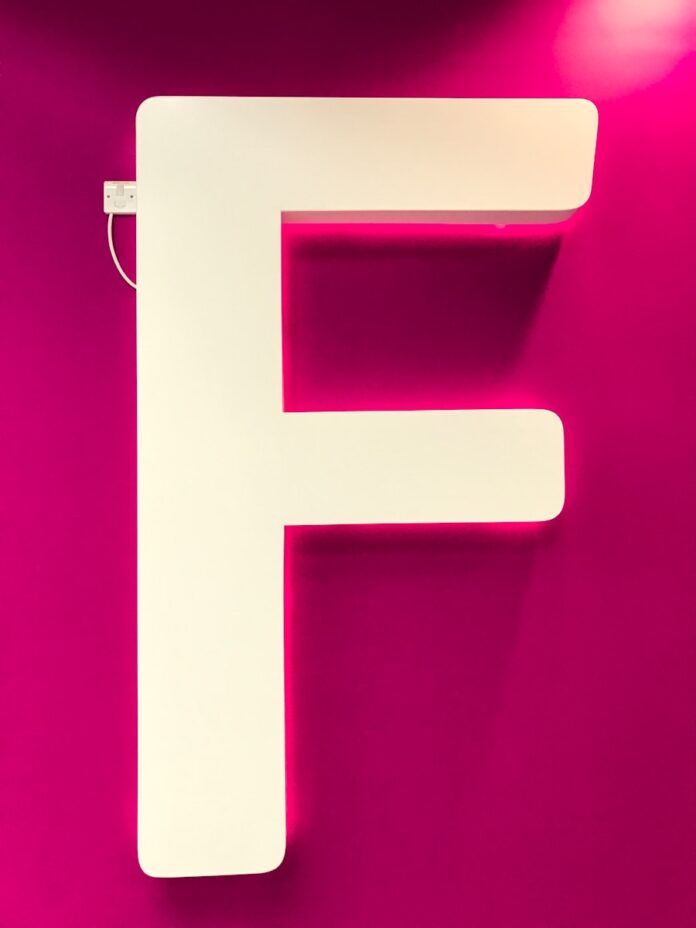 Photo by Nik letter F signage