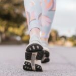 걷는 자가 세상을 바꾼다: ‘걷는 삶’이 주는 진정한 자유와 회복 person wearing black and white nike shoes